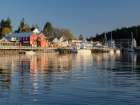View of La Conner, Washington State, waterfront from the Swinomish Channel. Art Print